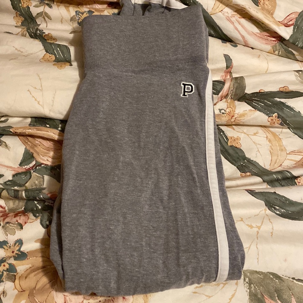 Victoria’s Secret light grey leggings with white strips , cuffed at bottom.